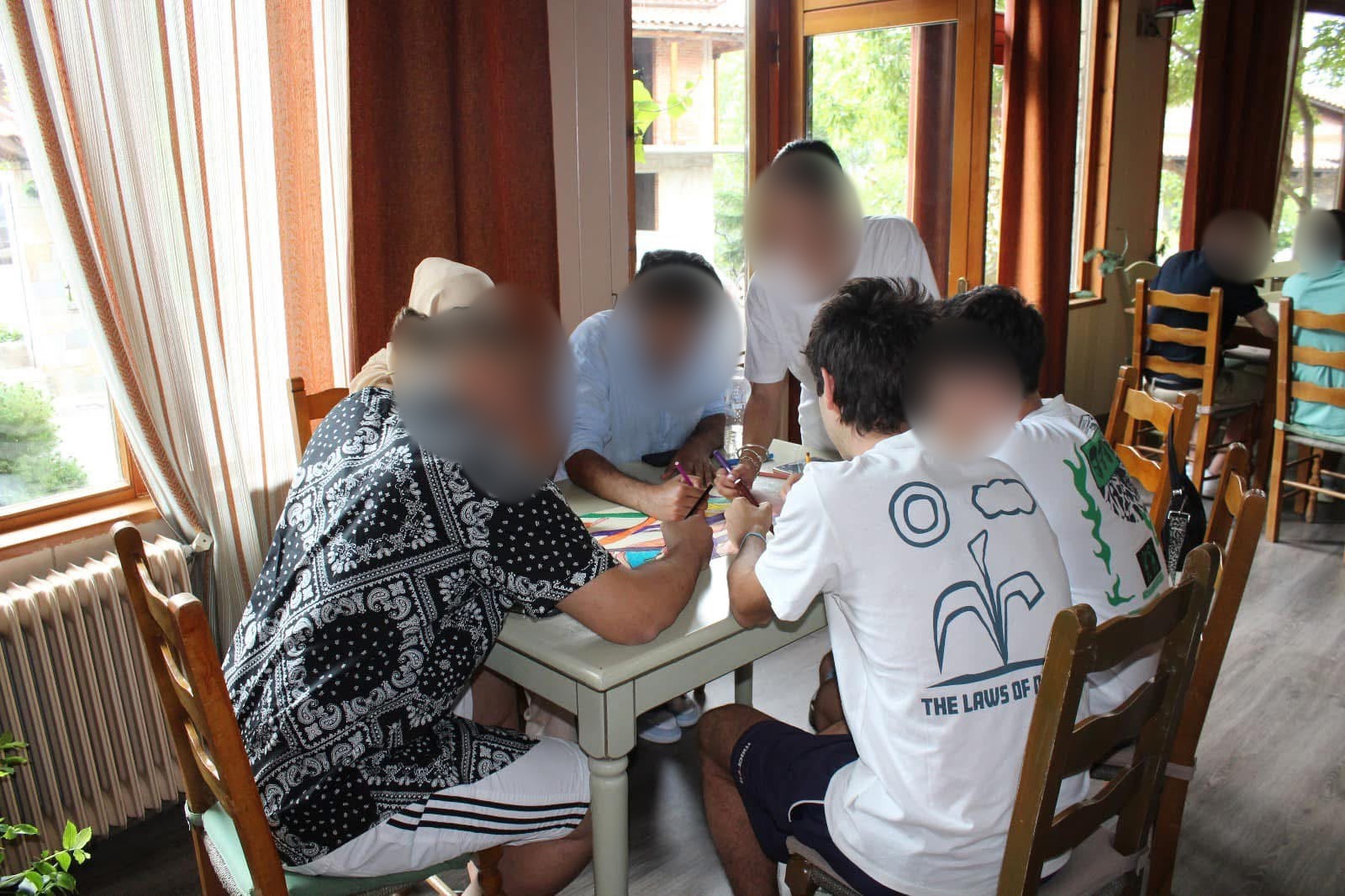 Participants working together on a drawing